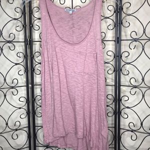 Asymmetric blush colored tank top
